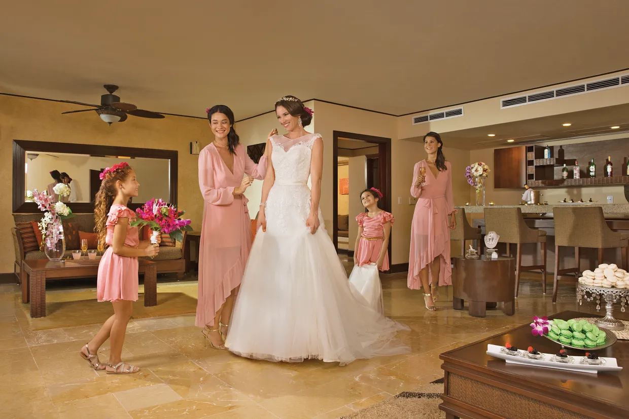 Bride getting ready with her bridesmaids ahead of her Punta Cana wedding ceremony