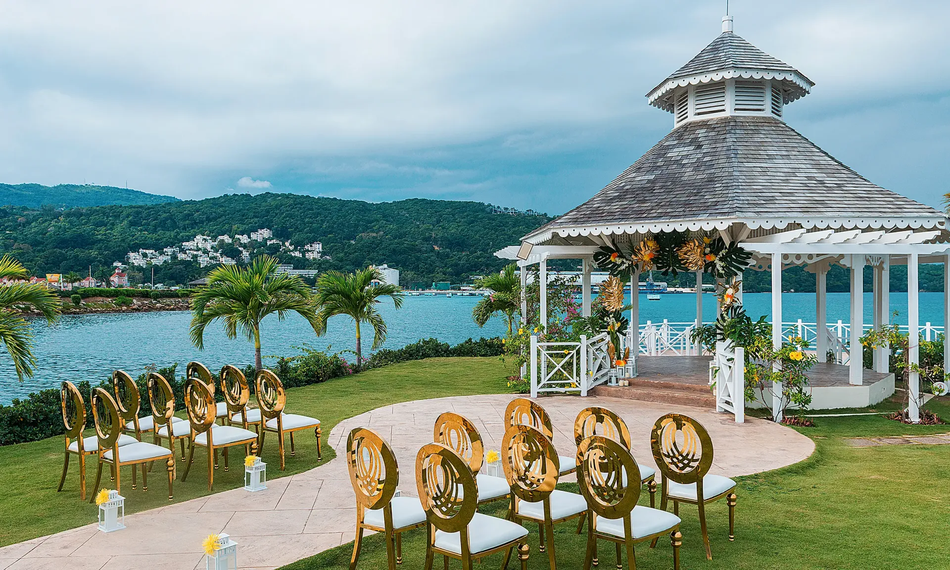 Gazebo wedding ceremony at Moon Palace Jamaica with guests seated on the beach