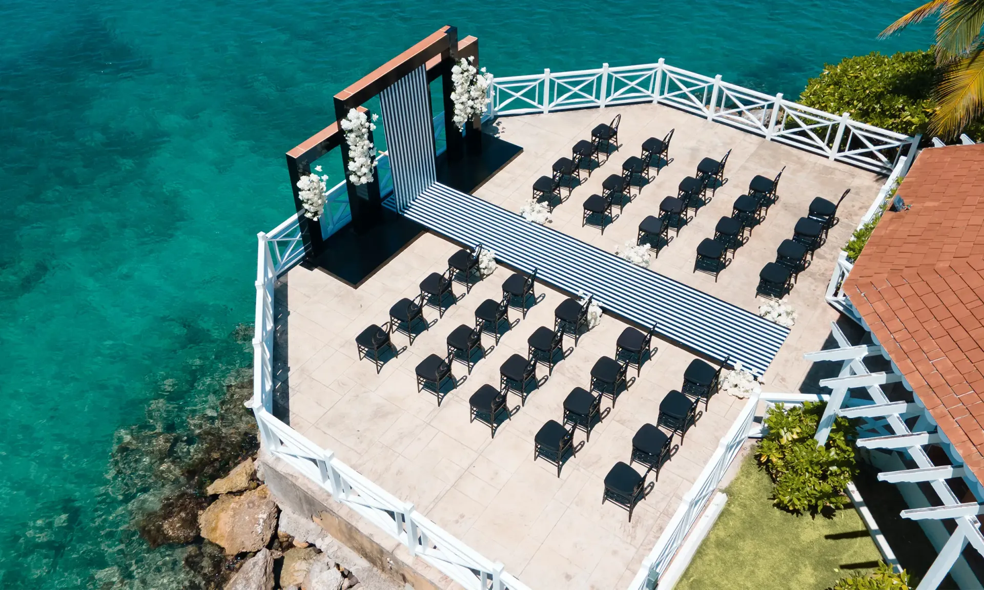 Oceanfront wedding ceremony venue at Moon Palace Jamaica with rows of chairs facing the sea