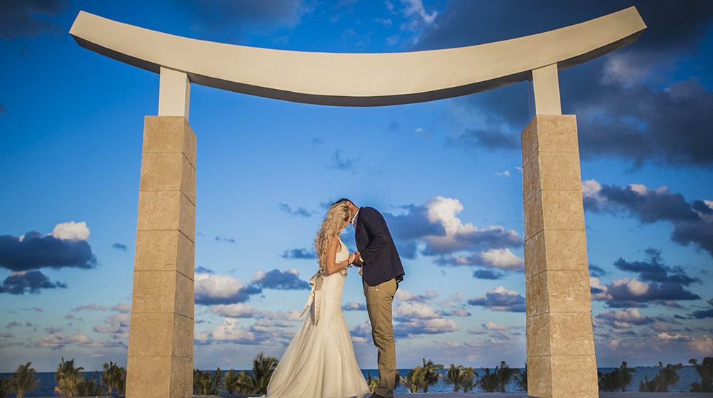 Canadian couple getting married at Dominican Republic Beach Wedding with Stone Arches